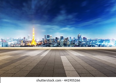 Cityscape And Skyline Of Tokyo At Twilight On View From Empty Street