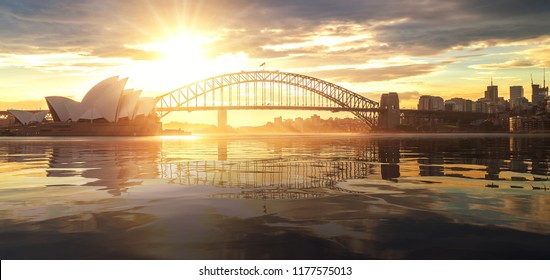Cityscape of Sysney harbour and bridge with morning sunrise moment and boat in the sea, New south wales, Australia, this immage can use for travel, trorist and Sysney concept 