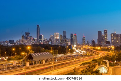 Cityscape  of Tel Aviv skyscrapers at night.