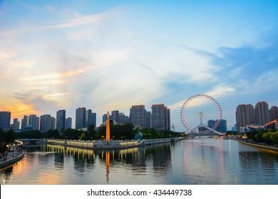 Cityscape of Tianjin ferris wheel,Tianjin eyes in twilight time before night. Most Modern and popular landmark in Tianjin city.