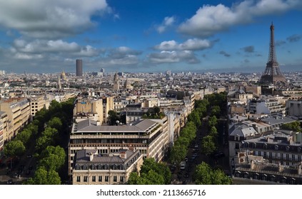 Cityscape Of Tree-lined Boulevards And The Eifel Tower In Paris, France, Seen From The Top Of The Arc De Triiomphe