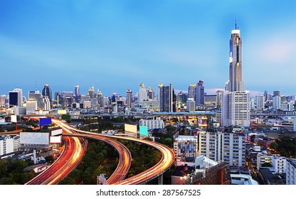 Cityscape twilight, Baiyok tower with traffic in Bangkok.
