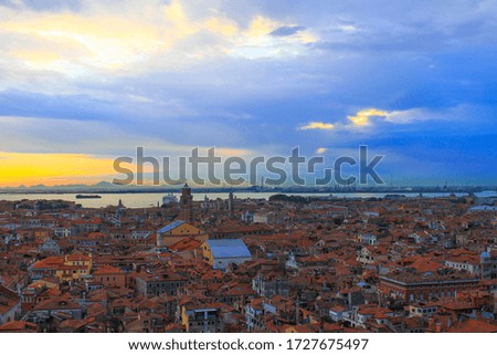 Cityscape of Venice. Roofs of the old city from a height. Venice from above. Sunset in Venice. Italy.