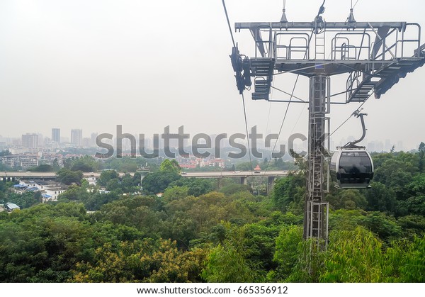 Cityscape view from cable car in Bayun mountain,\
travel in Guangzhou,\
China