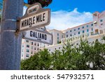 Cityscape view of the intersection of Miracle Mile and Galiano Street in Coral Gables, Florida.