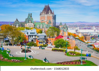 Cityscape view of Old Quebec City in Autumn, from hill close to fortification, famous viewpoint to see Chateau Frontenac, Dufferin terrace, St. Lawrence river. Beautiful landscape scene in fall season