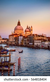 Cityscape view on Santa Maria della Salute basilica in sunset in Venice, Italy - Shutterstock ID 564818404