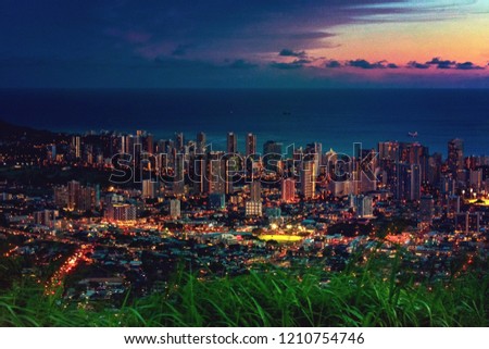 Cityscapes of Honolulu city and Waikiki beach in night time at Tantalus lookout , Honolulu, Oahu island, Hawaii