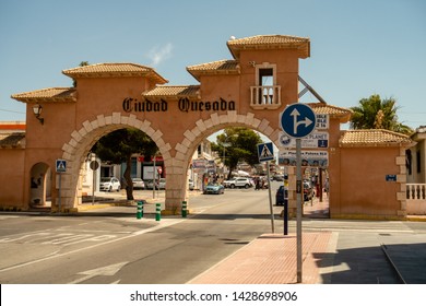 Ciudad Quesada, Alicante, Spain - June 19 2019 : The Arches As You Enter Quesada, Busy As Usual