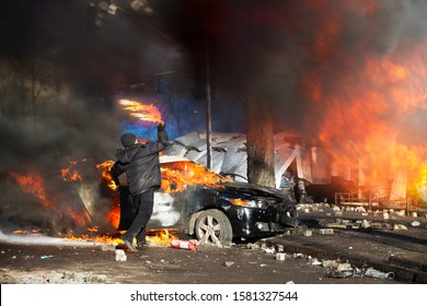 Civil conflict in society took the form of a violent confrontation between radical citizens of countries and the police and special forces, build barricades, burn tires and cars, throw stones - Shutterstock ID 1581327544