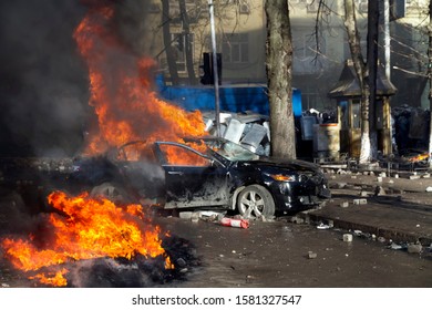 Civil conflict in society took the form of a violent confrontation between radical citizens of countries and the police and special forces, build barricades, burn tires and cars, throw stones - Shutterstock ID 1581327547