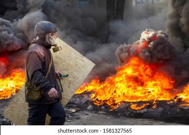 Civil conflict in society took the form of a violent confrontation between radical citizens of countries and the police and special forces, build barricades, burn tires and cars, throw stones - Shutterstock ID 1581327565