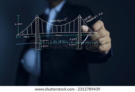 A civil engineer is drawing a bridge design on a virtual screen and determining its width, length, height and calculating strength of the materials to be used to build the bridge. Structure concept.