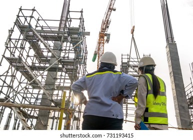 Civil Engineer Inspec Tower Crane Lift Up Scaffolding In Construction Site