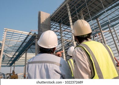 Civil Engineer And Safety Officer In Spec Steel Truss Structure Scaffolding Risk Analysis In Construction Site