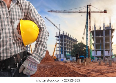  Civil Engineer Working In Building Construction Site And Sunset Sky With Crane Construction