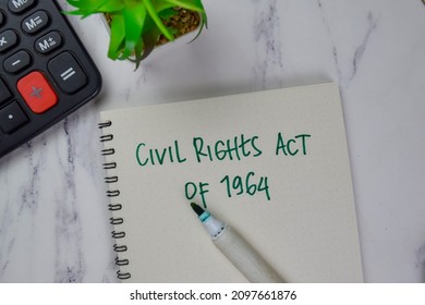 Civil Rights Act Of 1964 Write On A Book Isolated On Wooden Table.