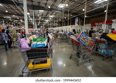 Clackamas, OR, USA - Jun 23, 2021: Checkout lanes in a Costco Wholesale store in Clackamas, Oregon.
