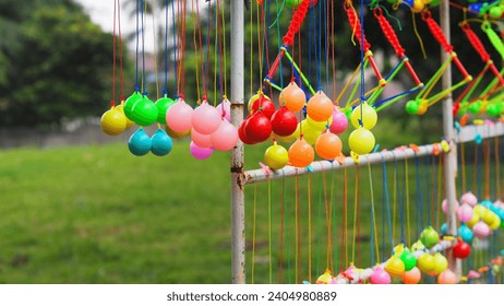 Clackers Ball or Click-Clack sold by traders with background edge of a gridiron