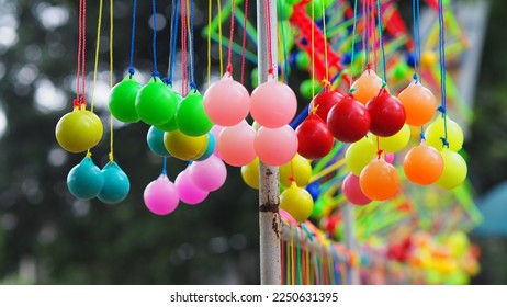 Clackers Balls (Latto-latto) sold on the roadside, with a variety of colors - Shutterstock ID 2250631395