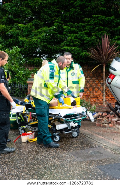 Clacton on Sea, Essex - 1st August 2016 - Emergency\
services on scene at a drink driving accident with an over turned\
and injured driver, Police, ambulance paramedics and fire brigade\
attend the scene