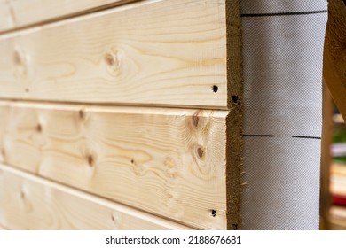 cladding of a wooden frame house with clapboard and vapor barrier. Construction of houses. - Shutterstock ID 2188676681