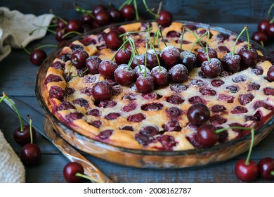 Clafoutis cherry pie in a glass dish. Close-up.