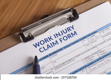Claim form for a work injury on a desk top