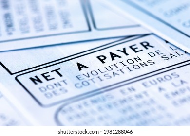 Clamart, France - April 12, 2019: French Payroll With Income Tax Deduction. Closeup Shot 