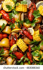 Clambake Seafood boil with boiled Crayfish, Corn on the Cob, Potatoes and Clams