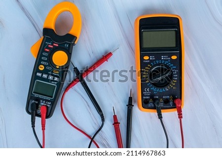 clamp meter and digital multimeter for electricians