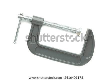 Clamp - professional tool for clamping objects isolated on a white background. Top view