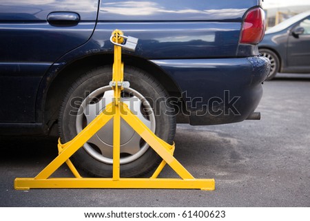 Clamped wheel of illegally parked car