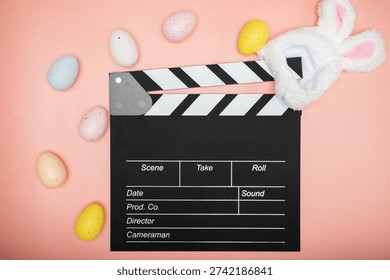 clapper board and easter bunny ears, film industry, production studio, movie scene, entertainment motion, action clapboard