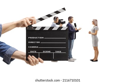 Clapper Board In Front Of A Male Reporter Interviewing A Young Woman Isolated On White Background