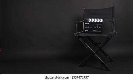 Clapper board or movie slate with director chair use in video production or movie and cinema industry. It's black color. - Shutterstock ID 1337471957