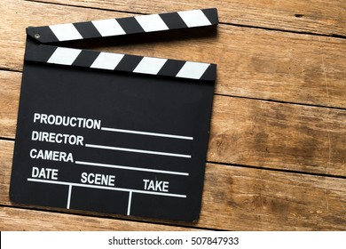 Clapper board,Movie clapper on  wooden backgrond