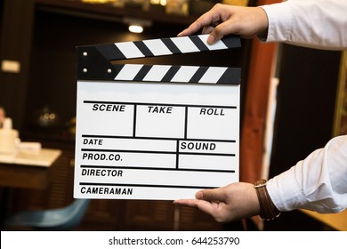 Clapperboard, Film production and movie making concept, on White brick background
