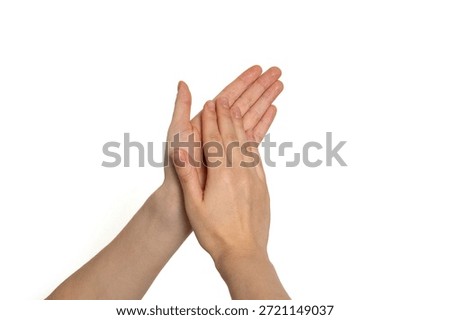 Clapping hands gesture symbolizing applause, approval, success, celebration, and positive feedback. Expressive body language on white background.
