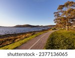 Clarence Foreshore and walking trail on a clear spring evening crossing the Derwent RIver in central Hobart, Tasmania, Australia.