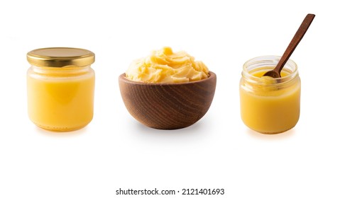 Clarified Butter In Jar And In Wooden Bowl, Cooking Oil, Pure Ghee Isolated On White Background. Clarified Butter With Copy Space For Text On White. Ghee Butter In A Bowl From Different Angles.