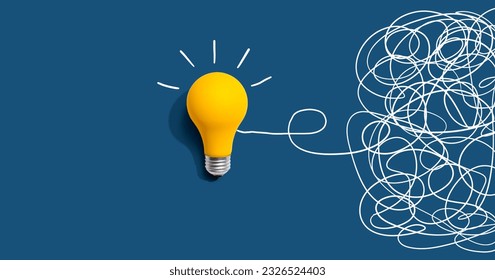 Clarifying complex ideas theme with light bulb - Flat lay