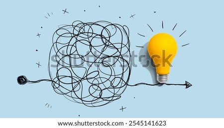 Clarifying complex ideas theme with light bulb - Flat lay