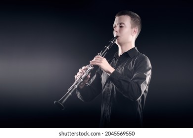 Clarinet Player Classical Musician Portrait. Clarinetist Playing Woodwind Musical Instrument