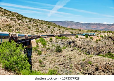 Clarkdale, Arizona, USA - May 4, 2019: Verde Canyon Railroad Train Driving On Scenic Route Over A Bridge