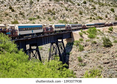 Clarkdale, Arizona, USA - May 4, 2019: Verde Canyon Railroad Train Driving On Scenic Route Over A Bridge