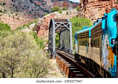 Clarkdale, Arizona, USA - May 4, 2019: Verde Canyon Railroad Train Engine Driving On Scenic Route Over A Bridge