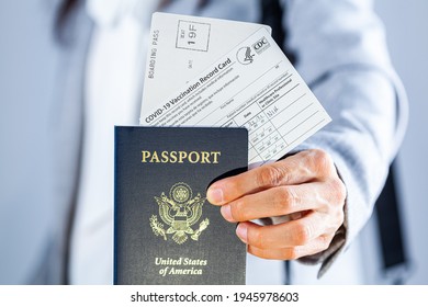 Clarksburg, MD, USA 03-29-2021: A Caucasian Businesswoman Is Showing Her Travel Documents At Airport Including US Passport, Boarding Pass And COVID Vaccination Record Card As A Proof Of Immunization.