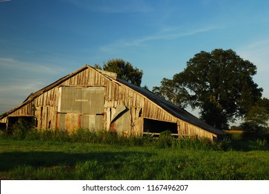 Clarksdale, MS, USA July 21 A Dilapidated Barn Barely Stands In A Farmer's Field Near Clarksdale, Mississippi