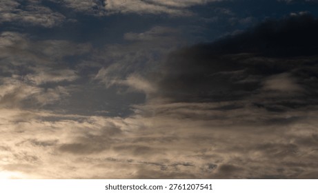 Clash Between white and dark clouds at sunset